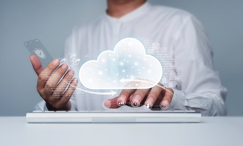 cloud-storage-icon-with-businessman-working-with-computer-glass-phone-cloud-computing-technology-service-connectivity-concepts-data-protection-exchange-file-information-transfer